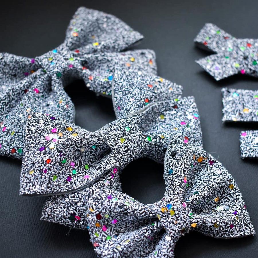 Party Like It's 1999 Glitter Bow