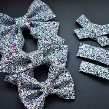 Party Like It's 1999 Glitter Bow
